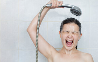 Portrait,Of,A,Young,Woman,In,Bathroom,Screaming,In,Shower