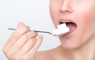 Beautiful,Woman,Face,Leads,Spoon,With,Sugar,Cubes,Into,Her