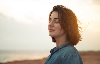 Great,Pleasure.,Charming,Calm,Young,Woman,Is,Standing,Near,Sea