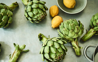 Green artichokes and lemons