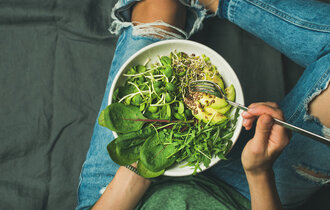 Green,Vegan,Breakfast,Meal,In,Bowl,With,Spinach,,Arugula,,Avocado,