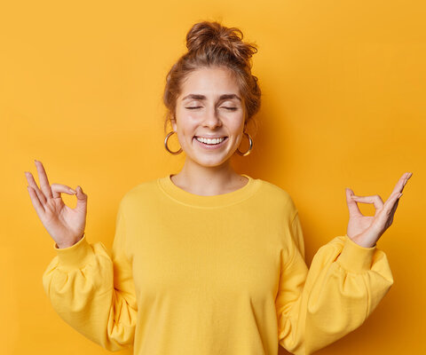 Happy,Calm,Patient,Young,Woman,Makes,Zen,Nirvana,Gesture,Meditates