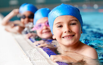 Portrait,Of,Children,In,Water,At,Edge,Of,Pool,Waiting